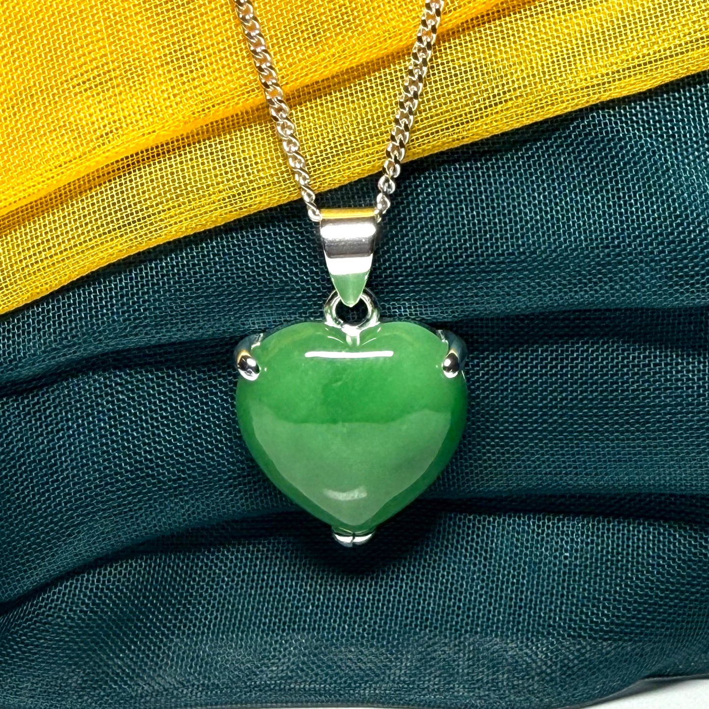 A real green jade pendant necklace heart shape sterling silver with chain too