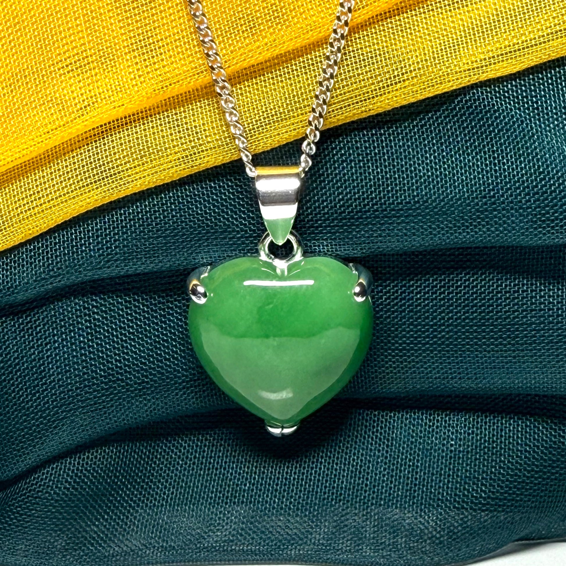 A real green jade pendant necklace heart shape sterling silver with chain too