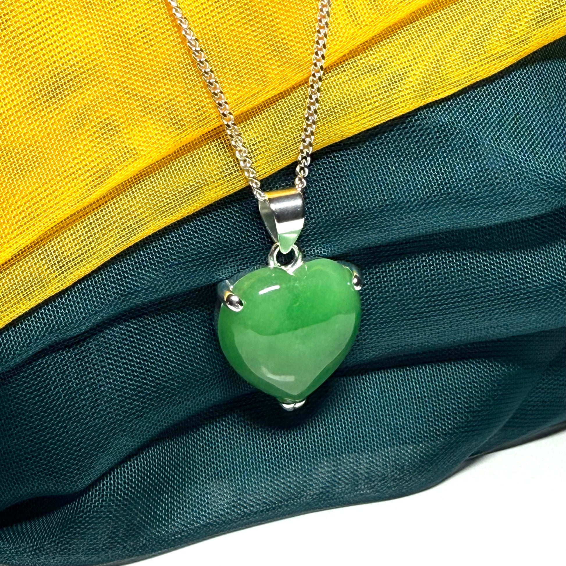 A real green jade pendant necklace heart shape sterling silver with chain too