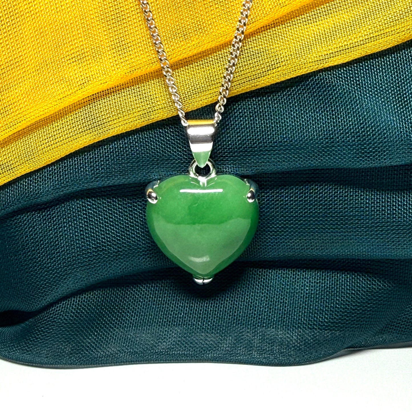 A real green jade pendant necklace heart shape sterling silver with chain too