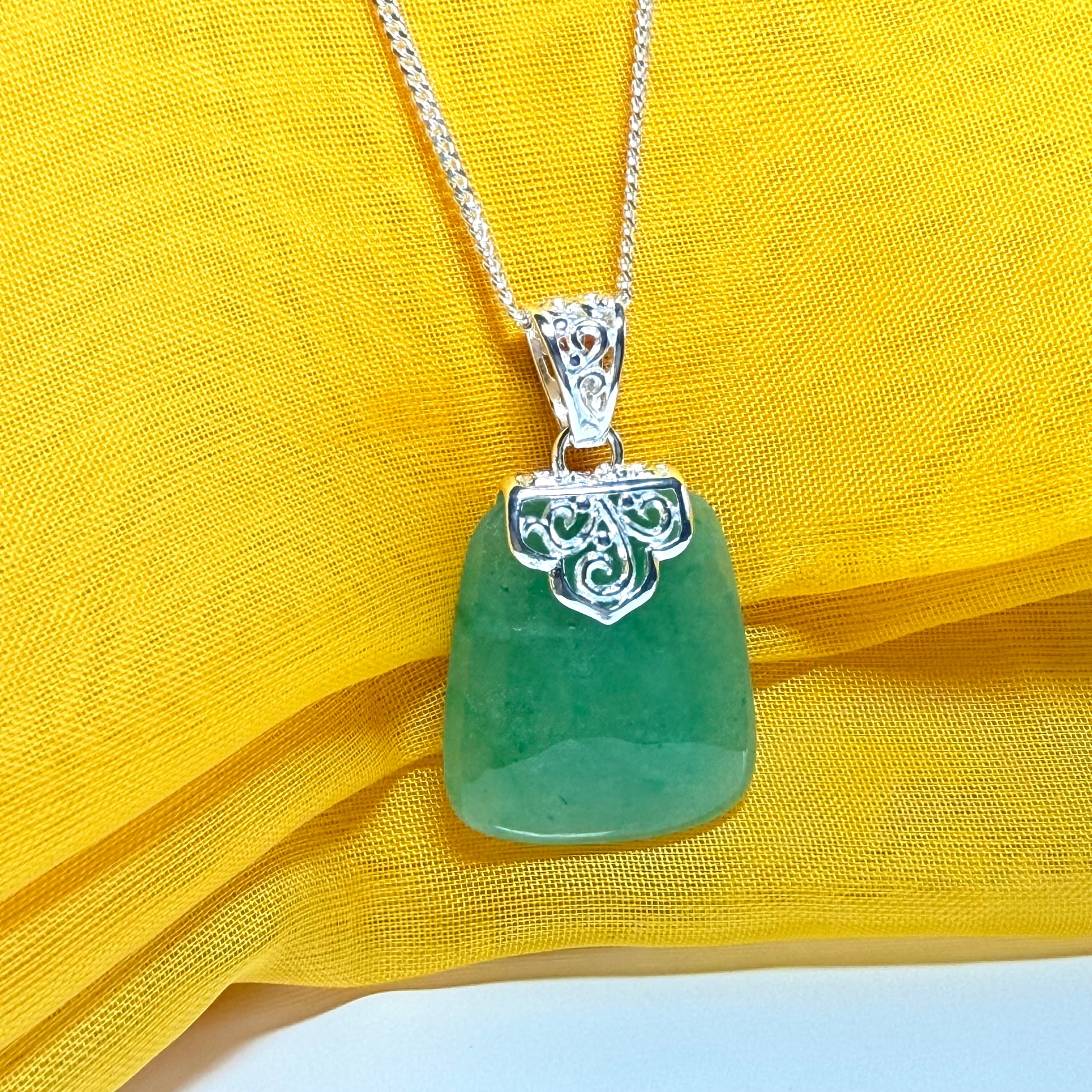 A real jade necklace green sterling silver large cushion shaped, a mesmerising designed pendant with chain