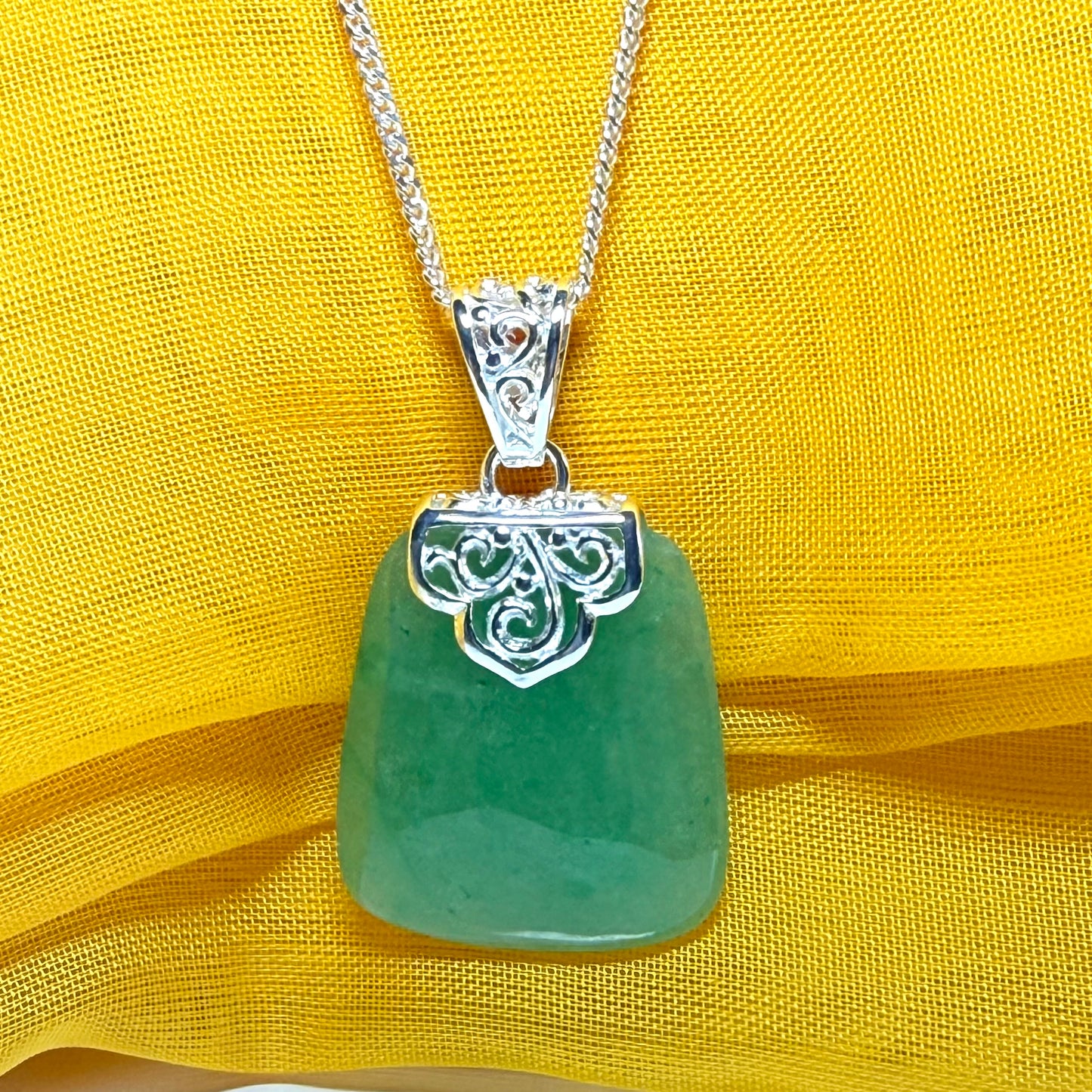 A real jade necklace green sterling silver large cushion shaped, a mesmerising designed pendant