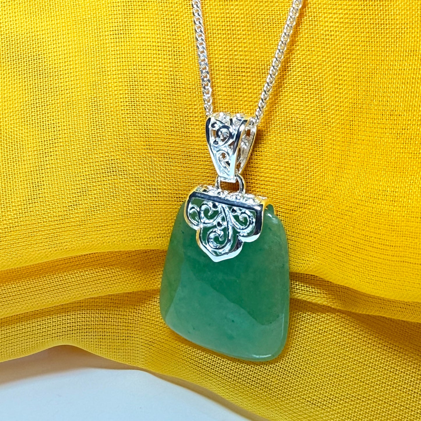 A real jade necklace green sterling silver large cushion shaped, a mesmerising designed pendant with chain
