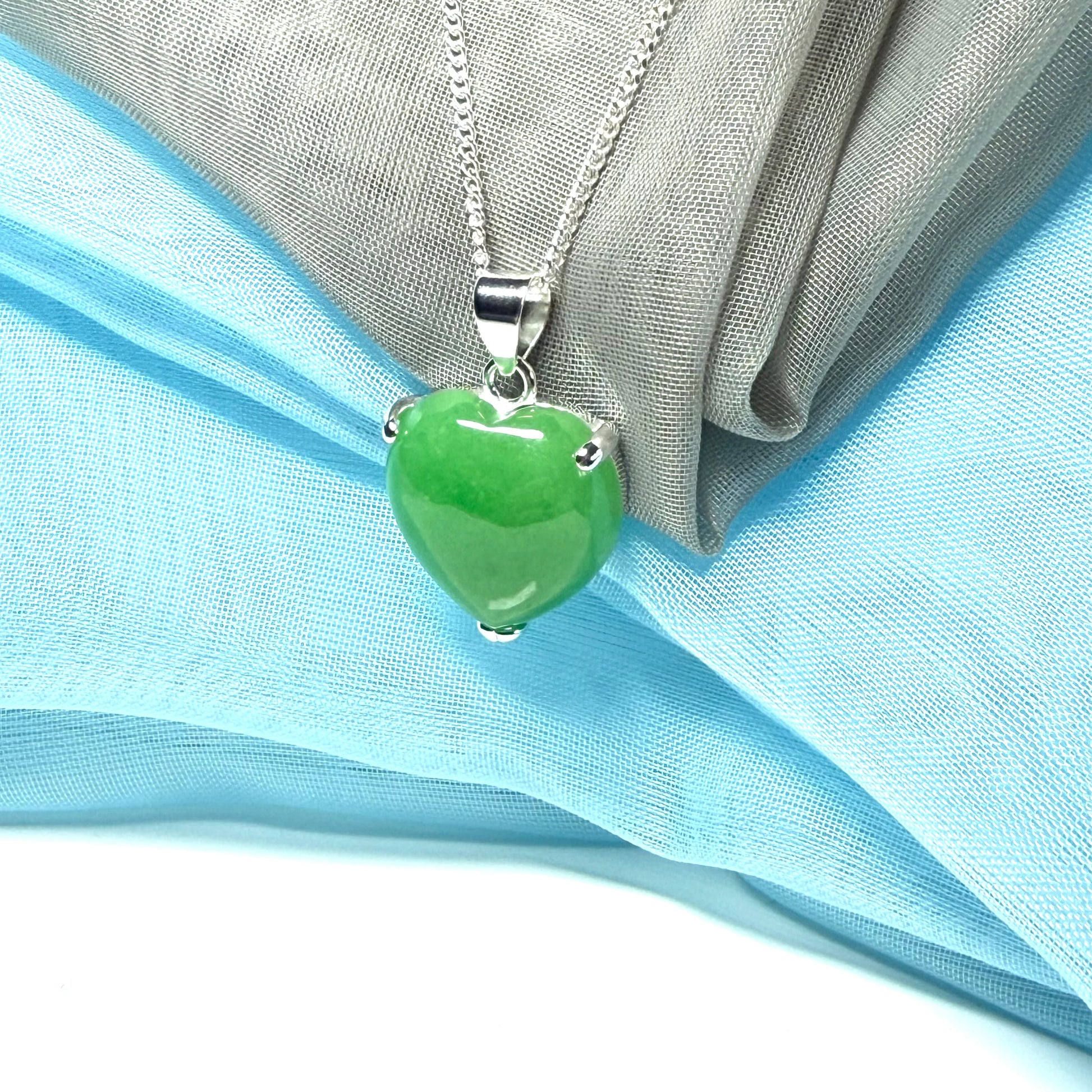 A real jade necklace heart shaped sterling silver love green coloured pendant
