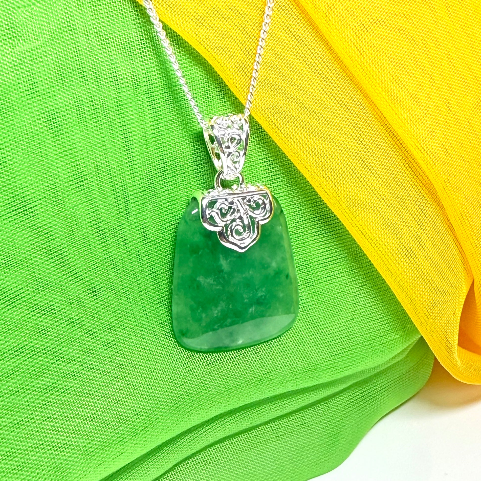 A real jade pendant green sterling silver large cushion shaped, a truly stunning necklace
