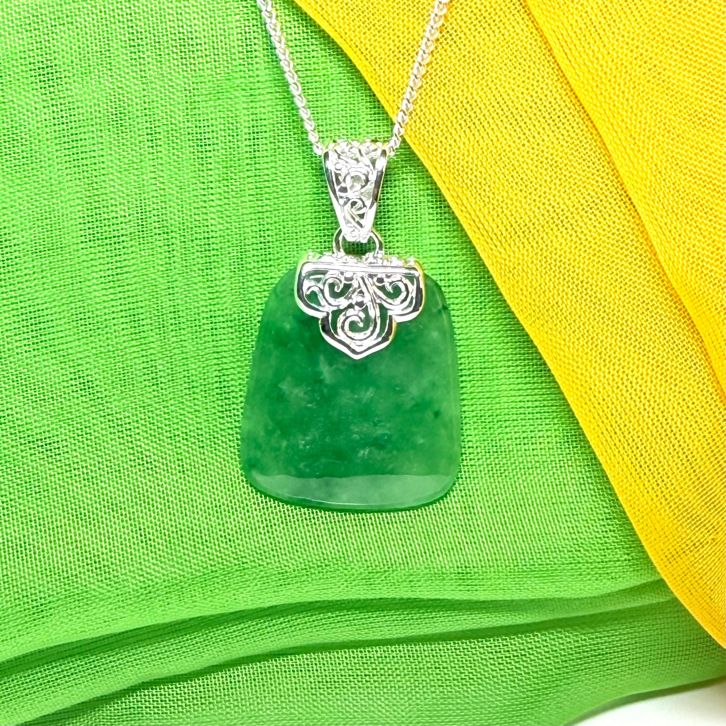 A real jade pendant green sterling silver large cushion shaped, a truly stunning necklace