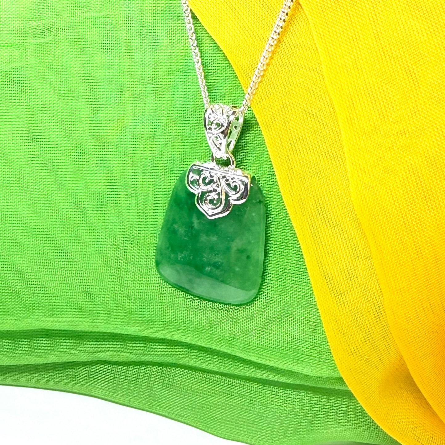 A real jade pendant green sterling silver large cushion shaped, a truly stunning necklace with a chain