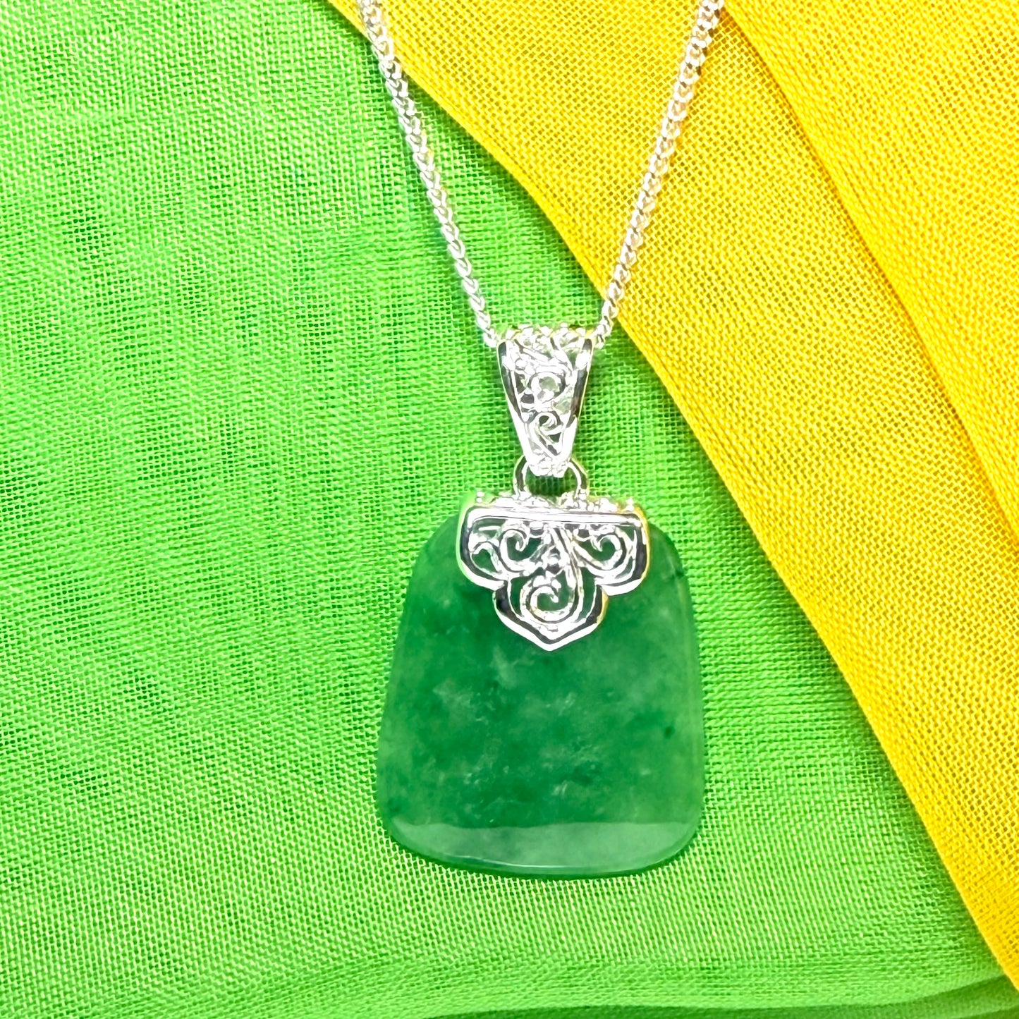 A real jade pendant green sterling silver large cushion shaped, a truly stunning necklace