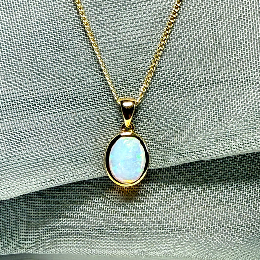 Real opal necklace yellow gold oval pendant smooth rubbed over smooth setting