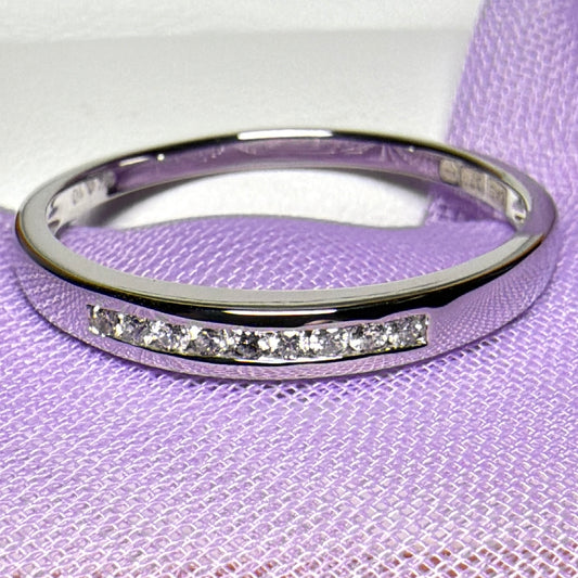 Real round cut diamond channel set eternity ring 10 points white gold
