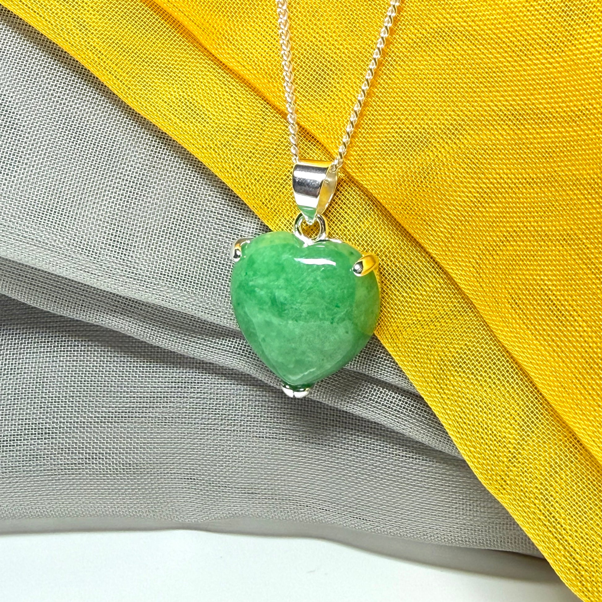A really beautiful real green jade necklace heart shaped sterling silver, a gorgeous pendant