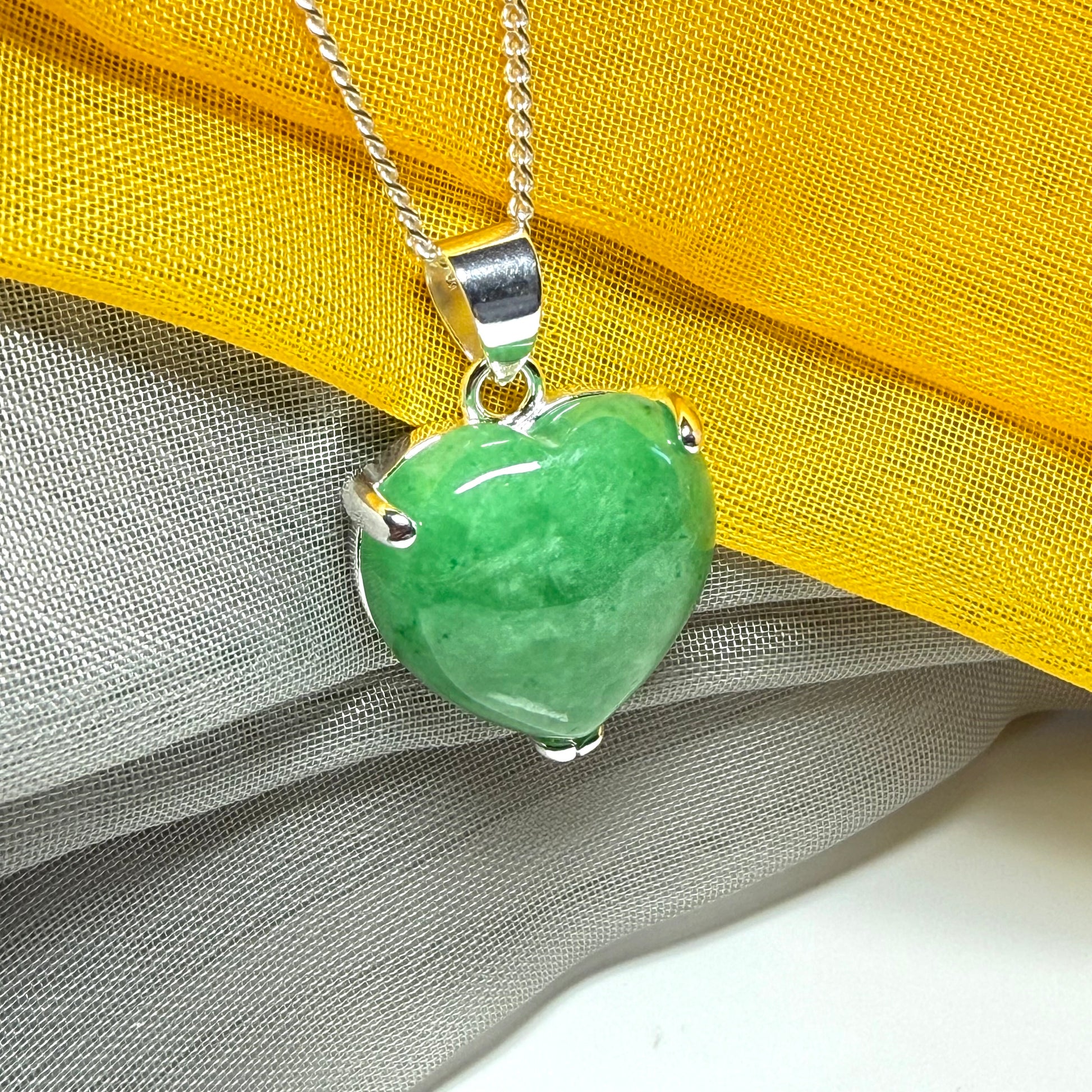 A really beautiful real green jade necklace heart shaped sterling silver, a gorgeous pendant