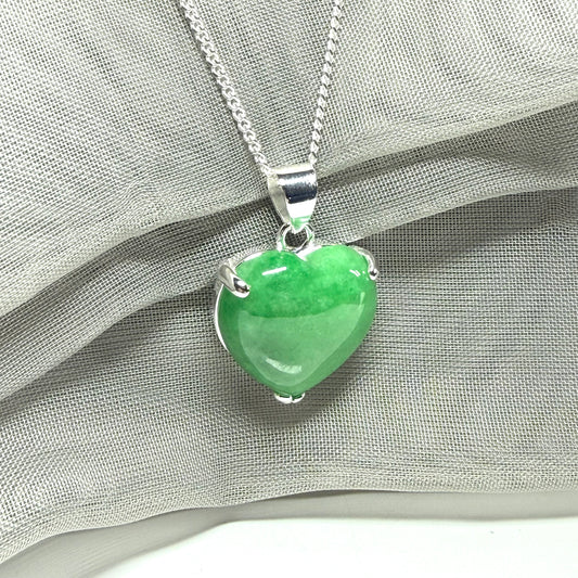 A really beautiful real green jade necklace heart shaped sterling silver, a stunning pendant
