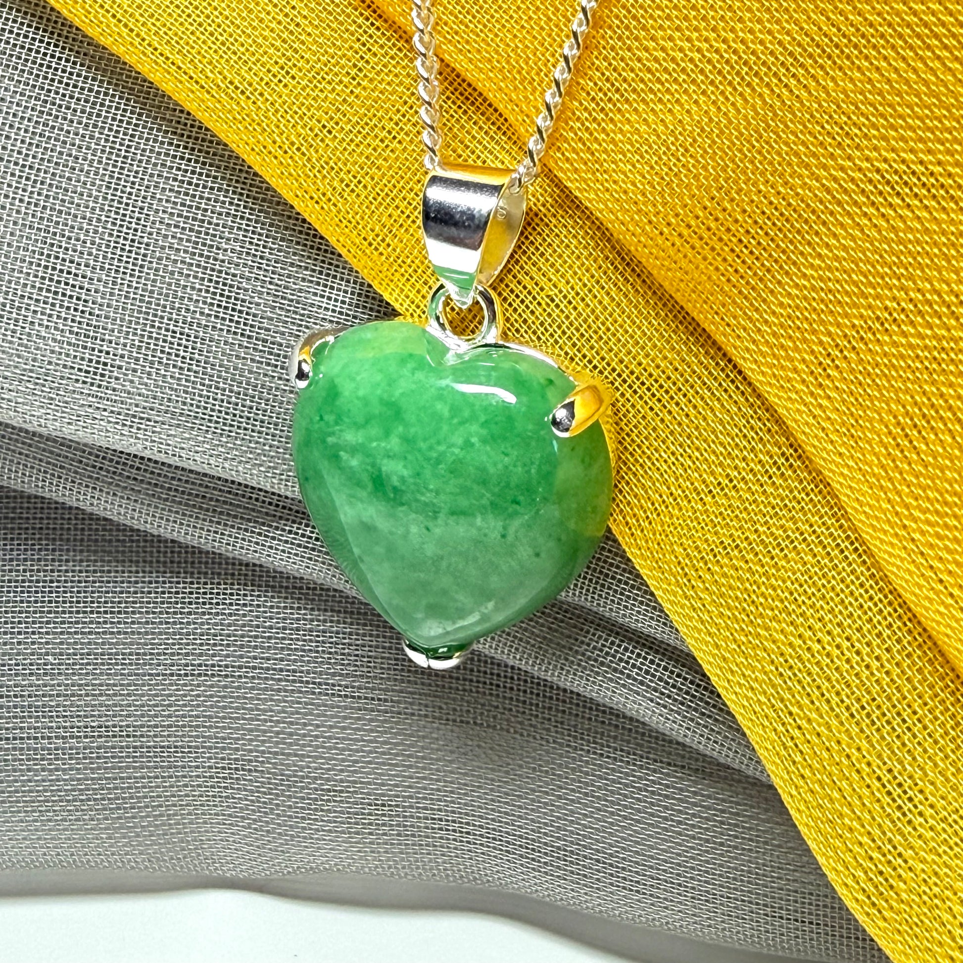 A really beautiful real green jade necklace heart shaped sterling silver, a gorgeous pendant
