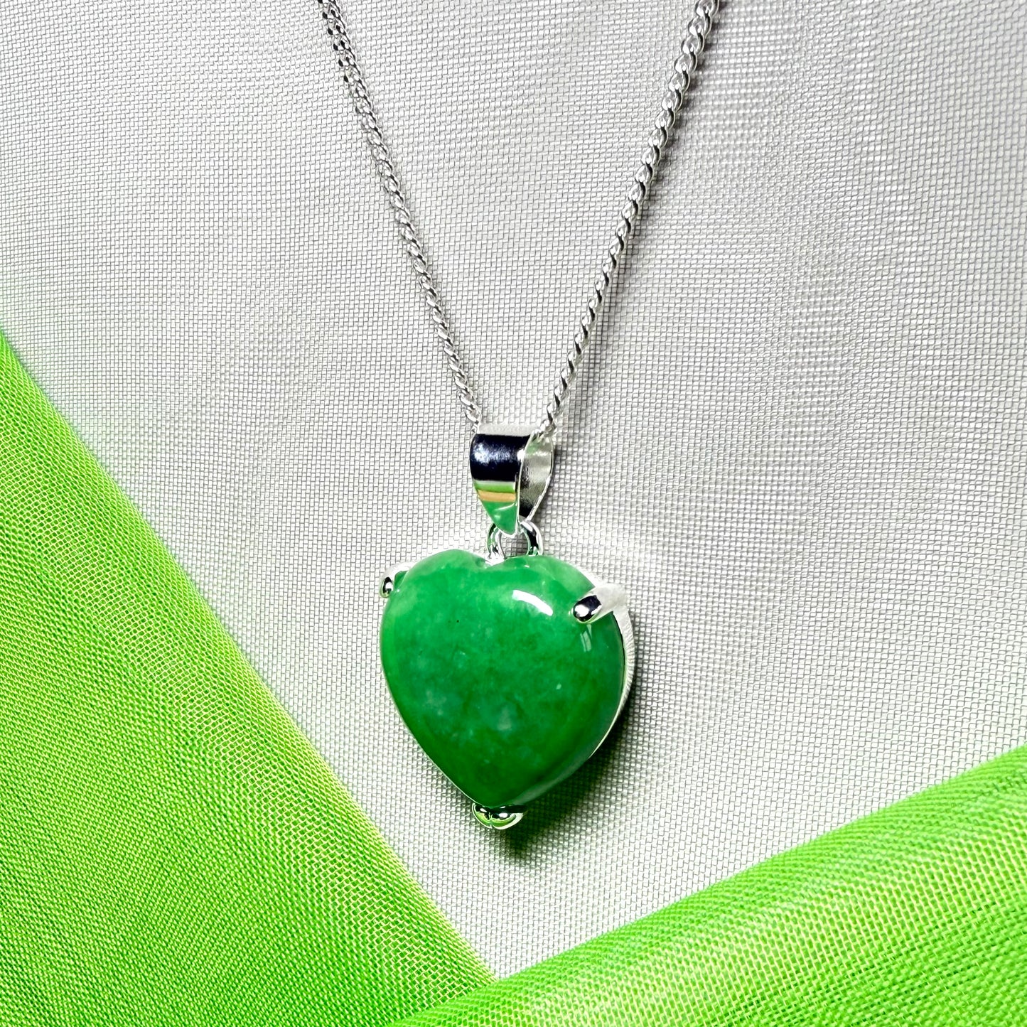 A really stunning pendant real green jade necklace heart shaped sterling silver including chain