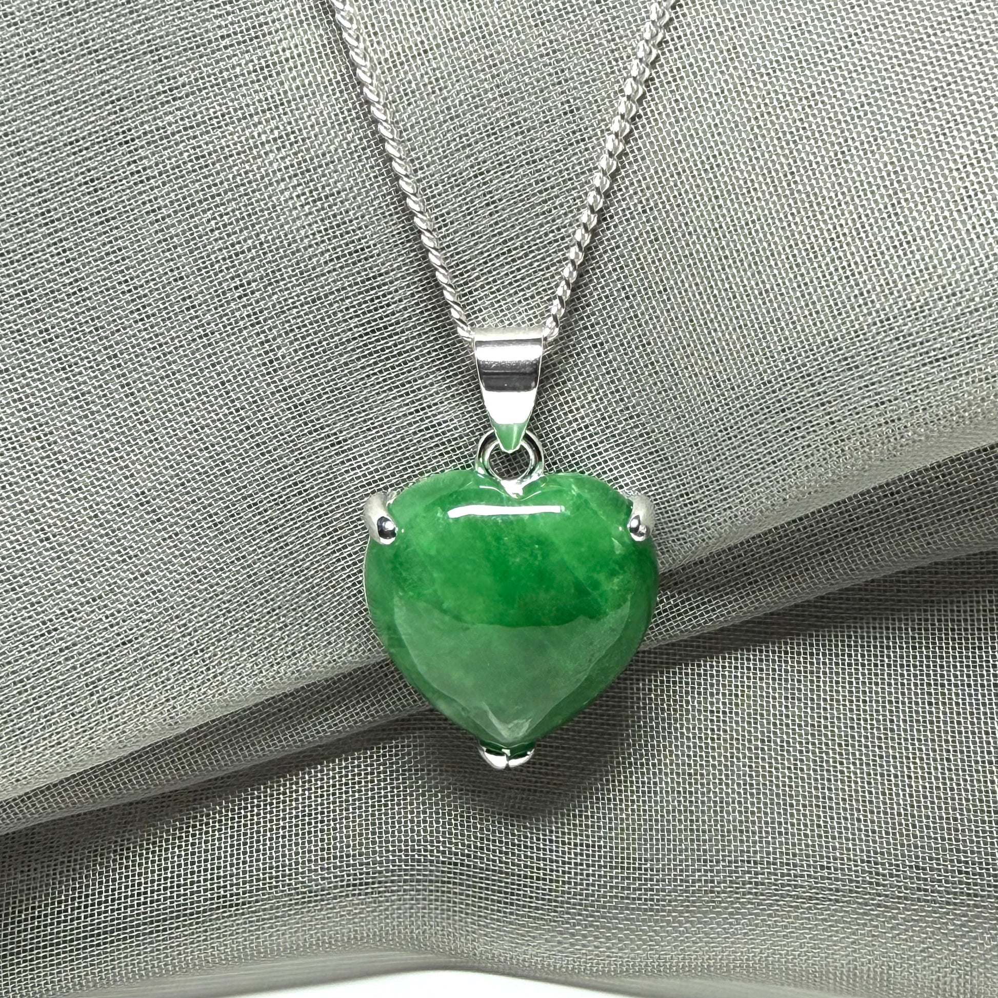 A really stunning pendant with a real jade necklace heart shaped sterling silver, green pendant