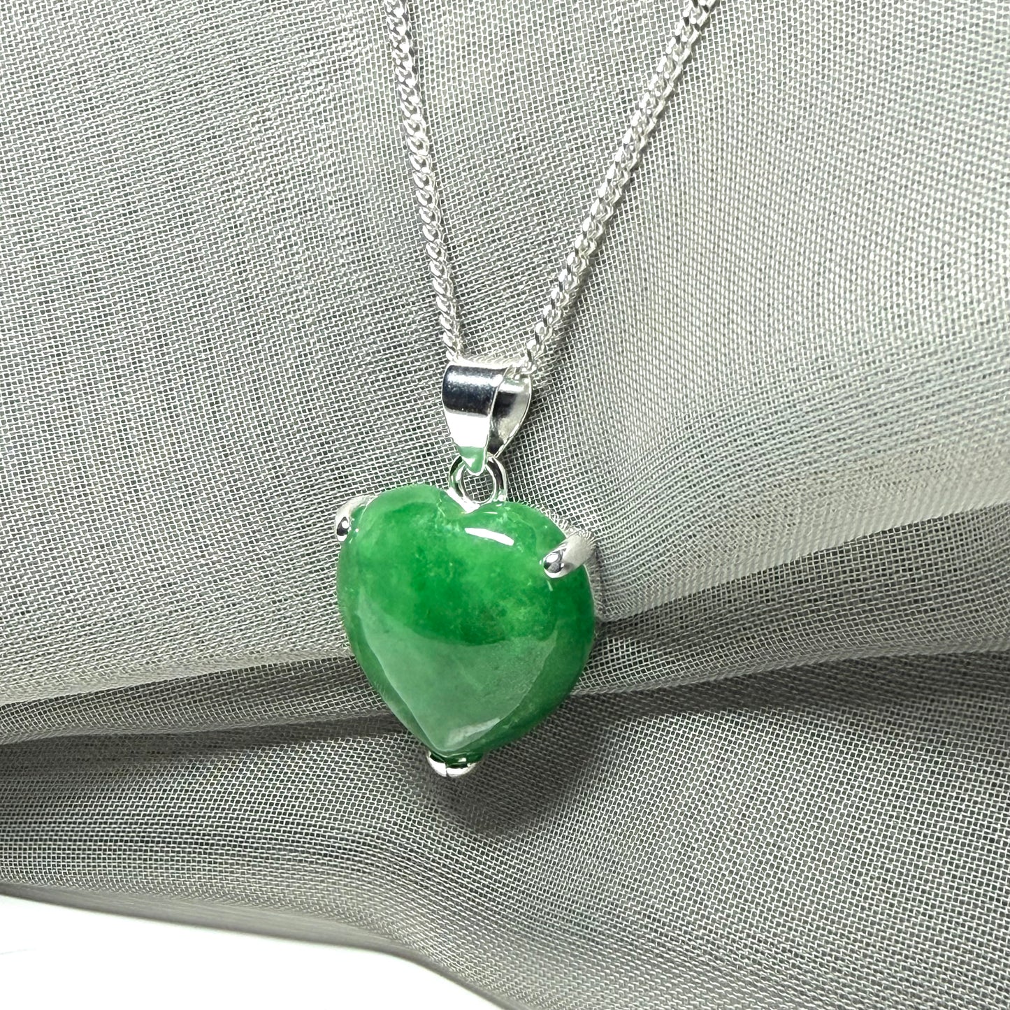 A really stunning pendant with a real jade necklace heart shaped sterling silver, green pendant
