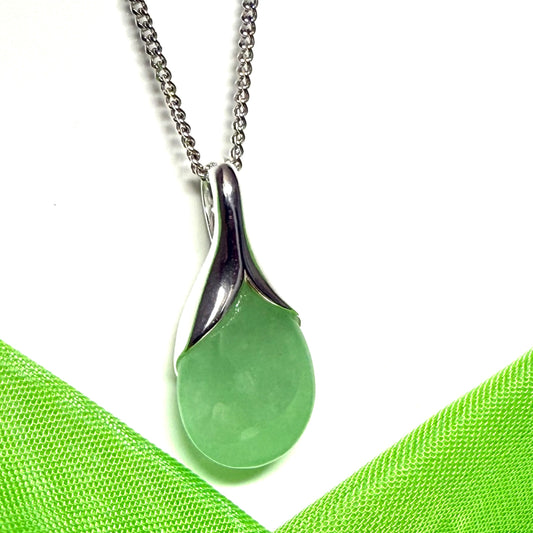 A really stunning real green jade necklace in a pear shaped design including a solid curb chain