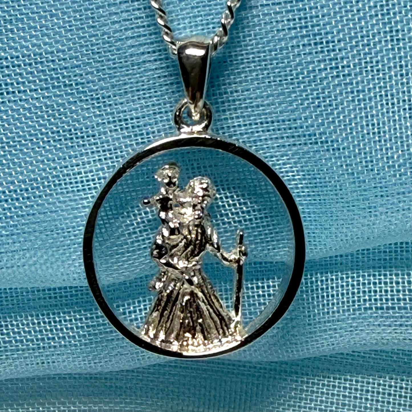 Round sterling silver St. Christopher including chain