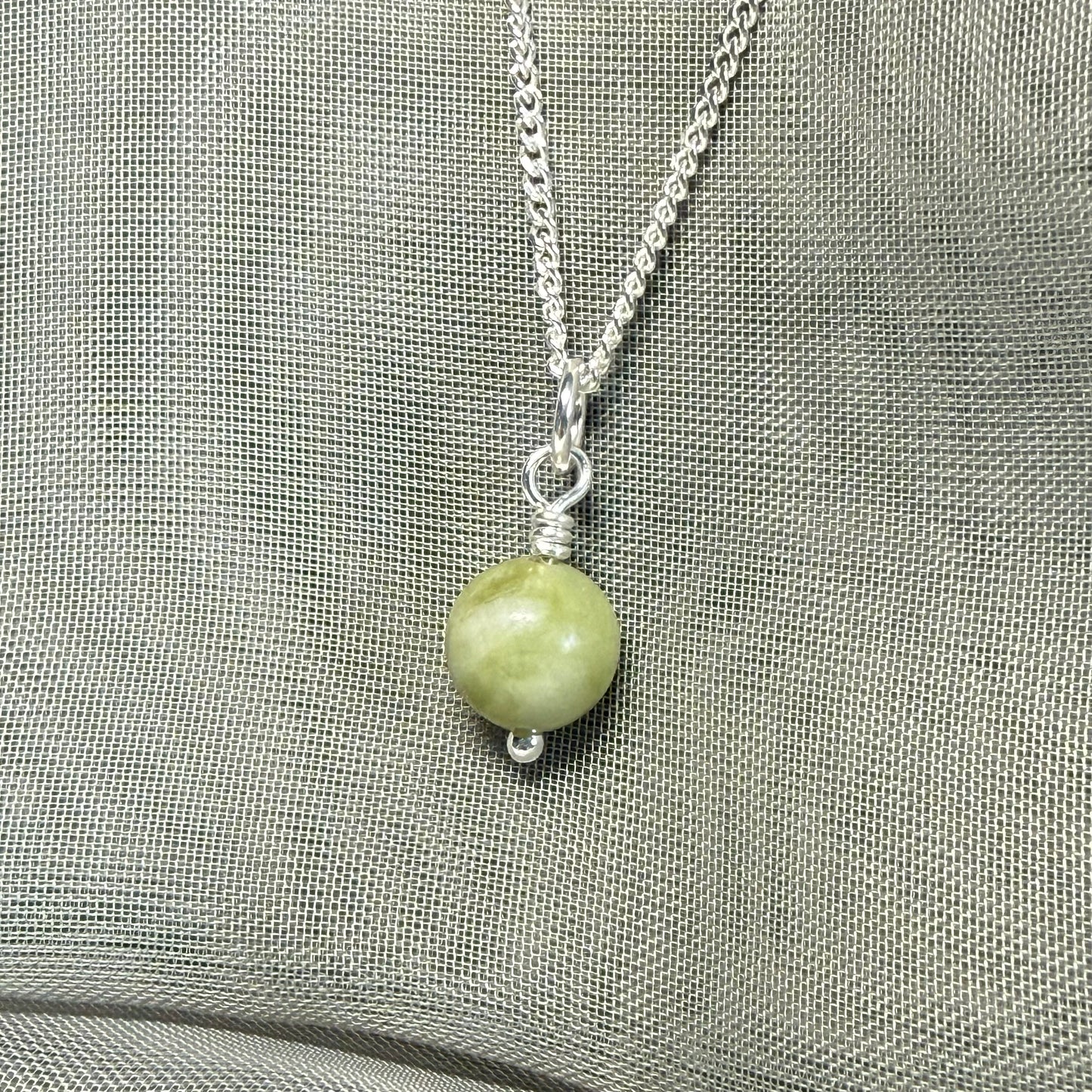 Small real green gypsum round necklace ball shape pendant with chain measuring 8.5 mm in diameter