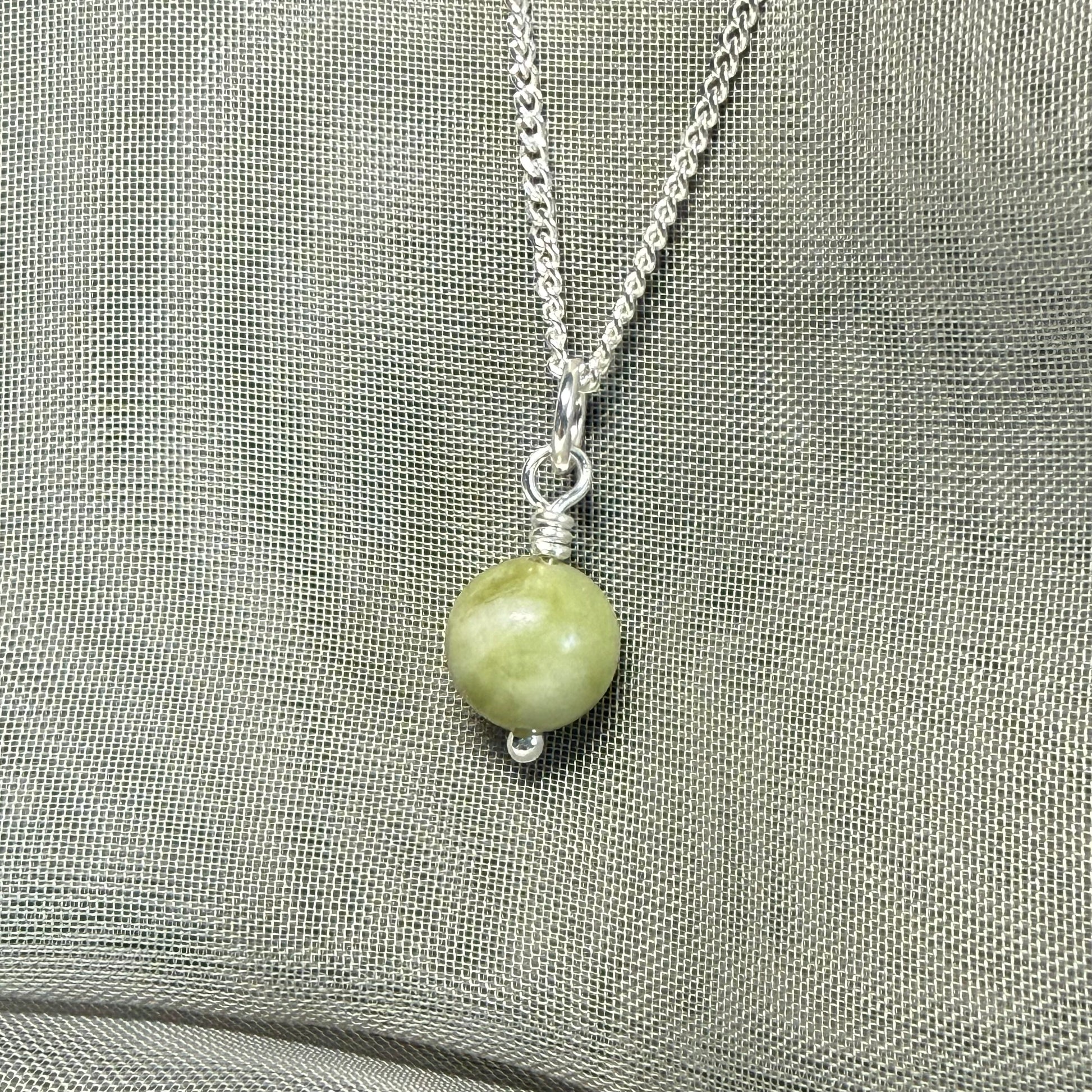 Small real green gypsum round necklace ball shape pendant with chain measuring 8.5 mm in diameter