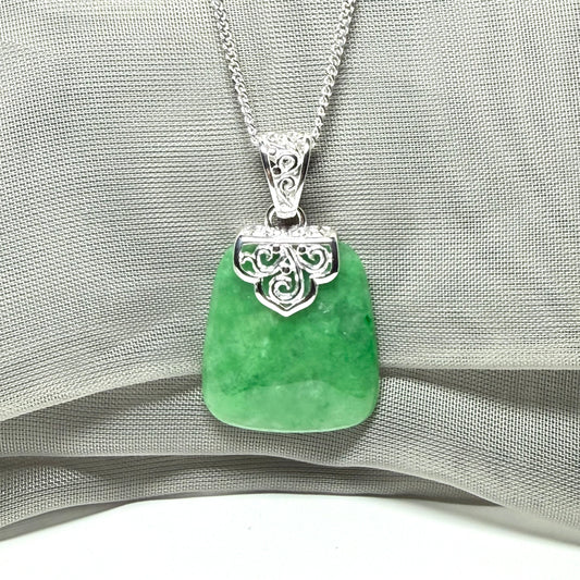 A stunned real jade necklace green sterling silver large cushion shaped pendant