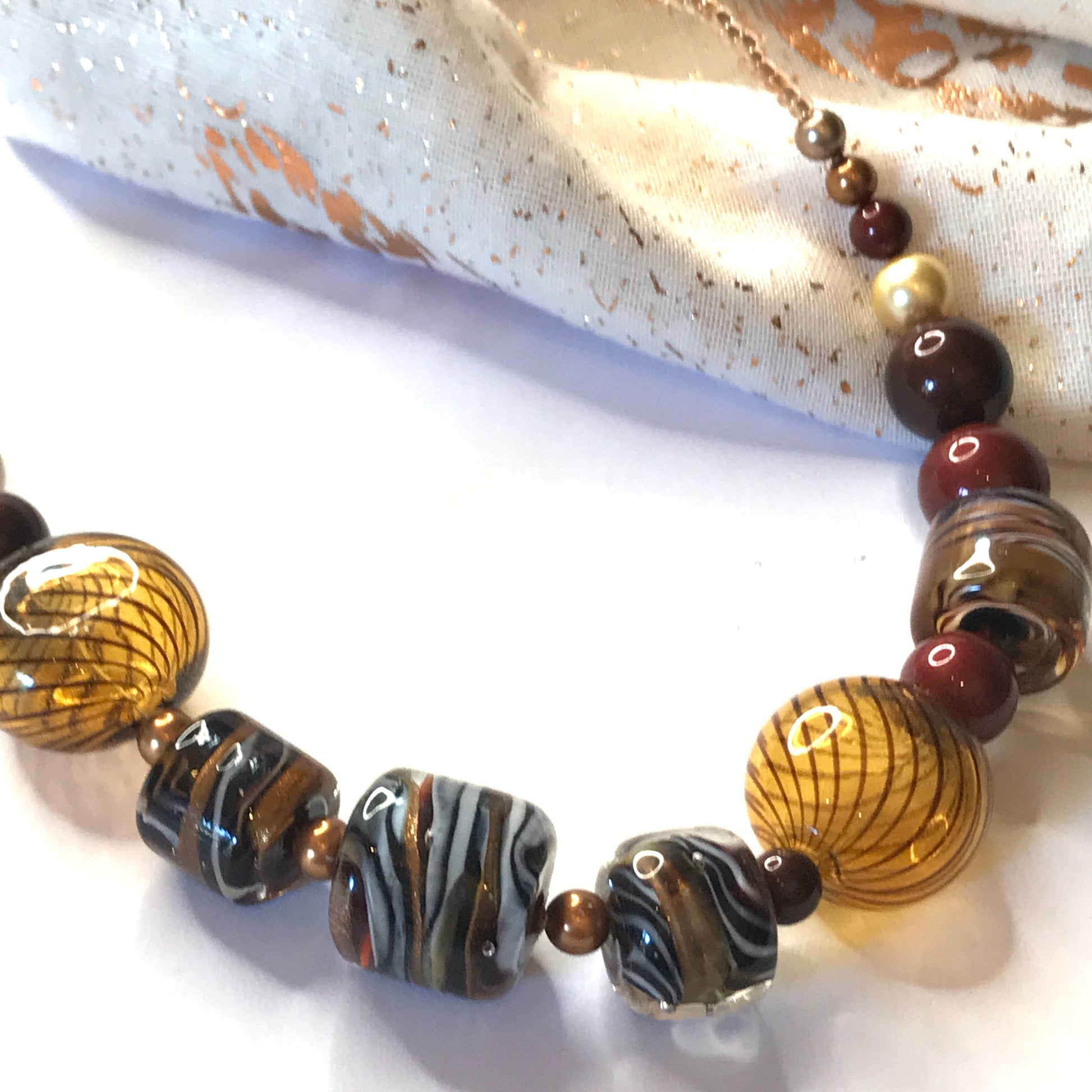 Beautiful brown, white, golden and black beaded real Murano glass necklace