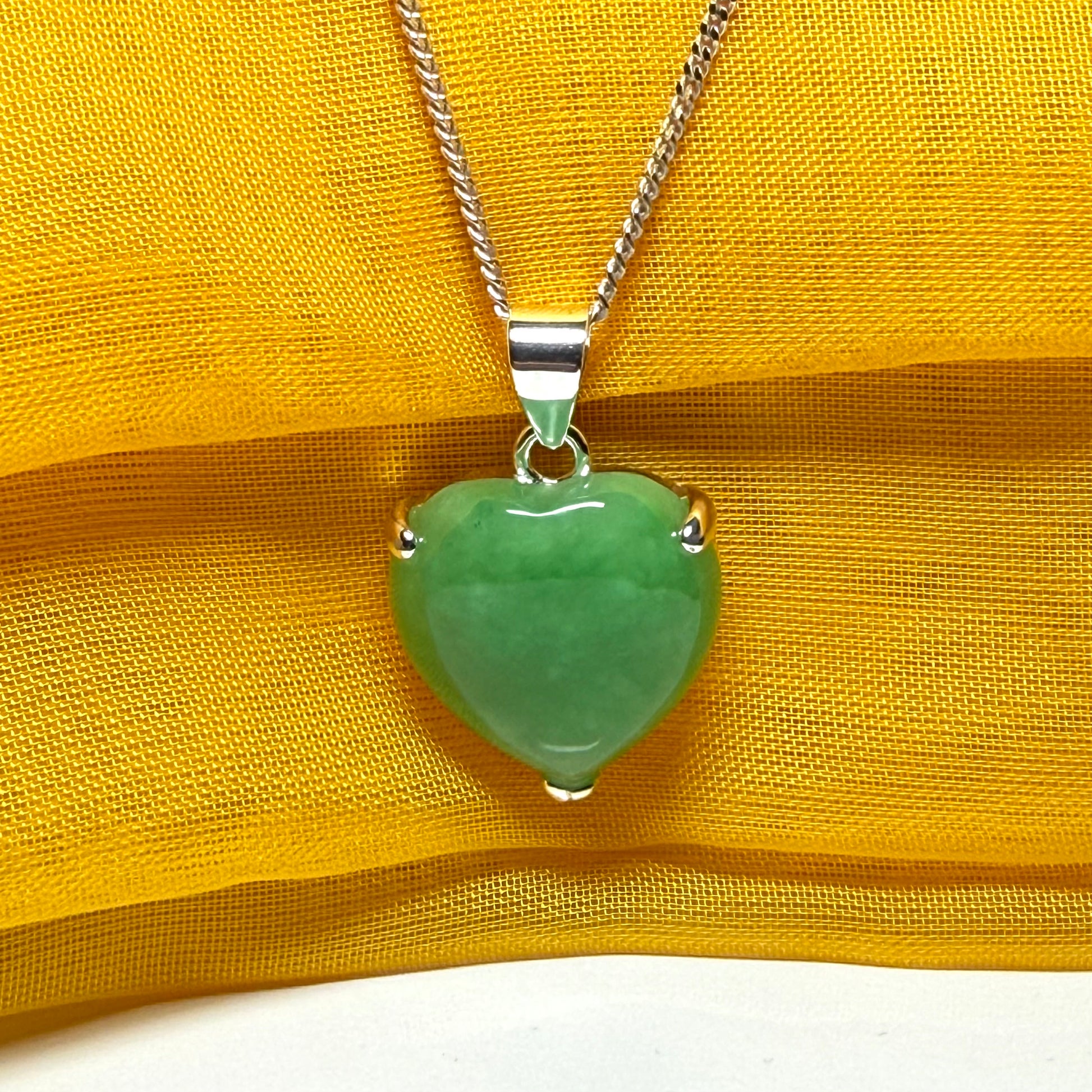 A gorgeous real green jade necklace heart shaped sterling silver, exquisitely designed pendant with chain