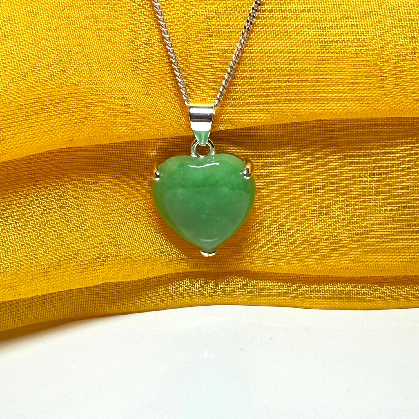 A gorgeous real green jade necklace heart shaped sterling silver, exquisitely designed pendant with chain