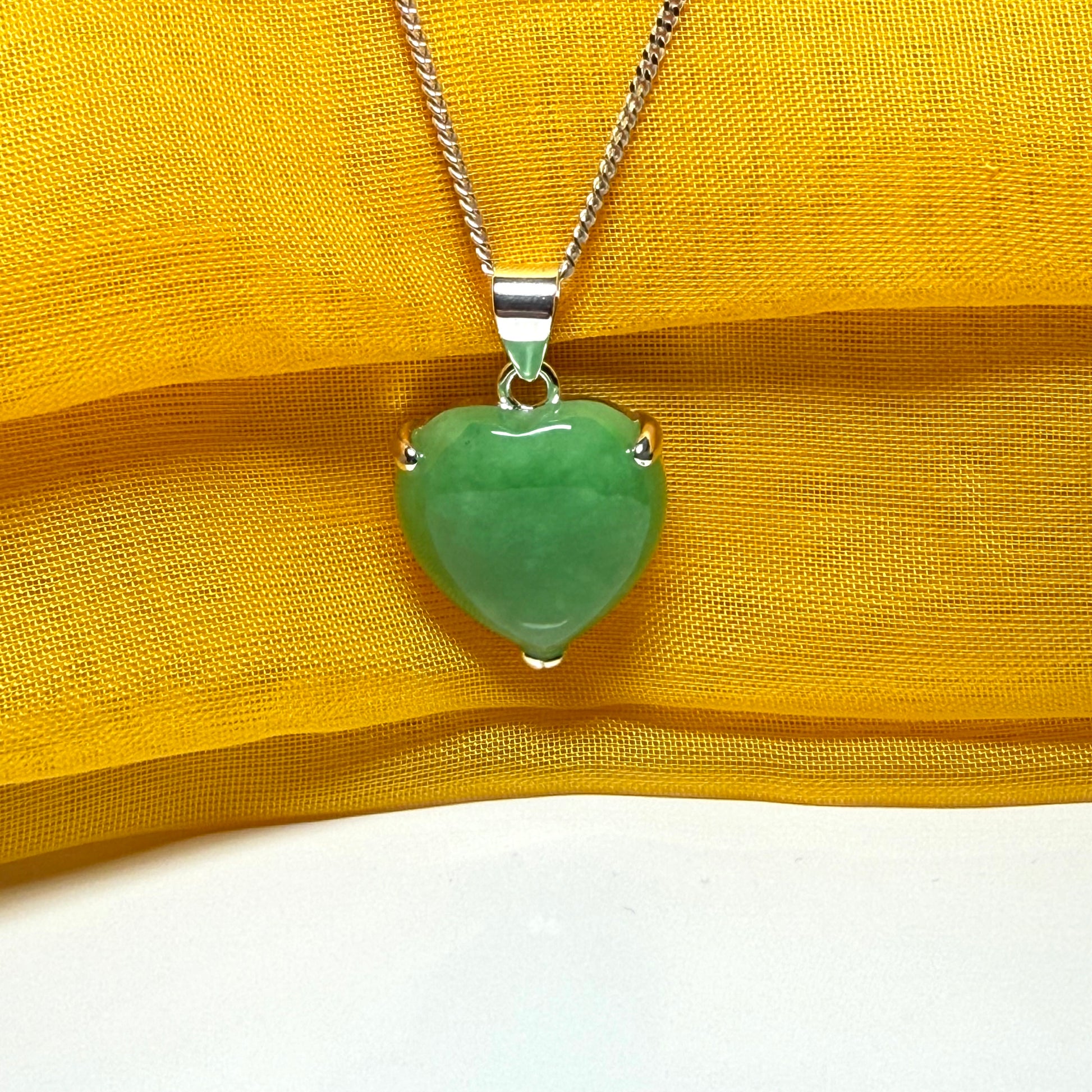 A gorgeous real green jade necklace heart shaped sterling silver, exquisitely designed pendant with chain