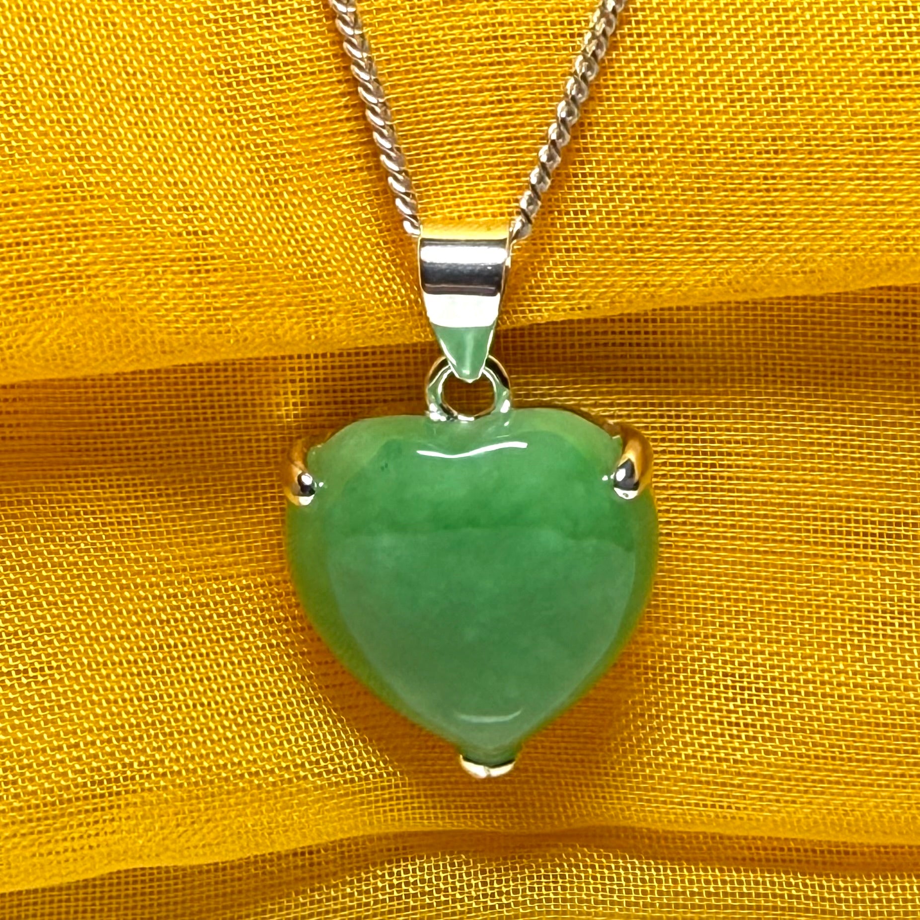 A gorgeous real green jade necklace heart shaped sterling silver, exquisitely designed pendant with chain