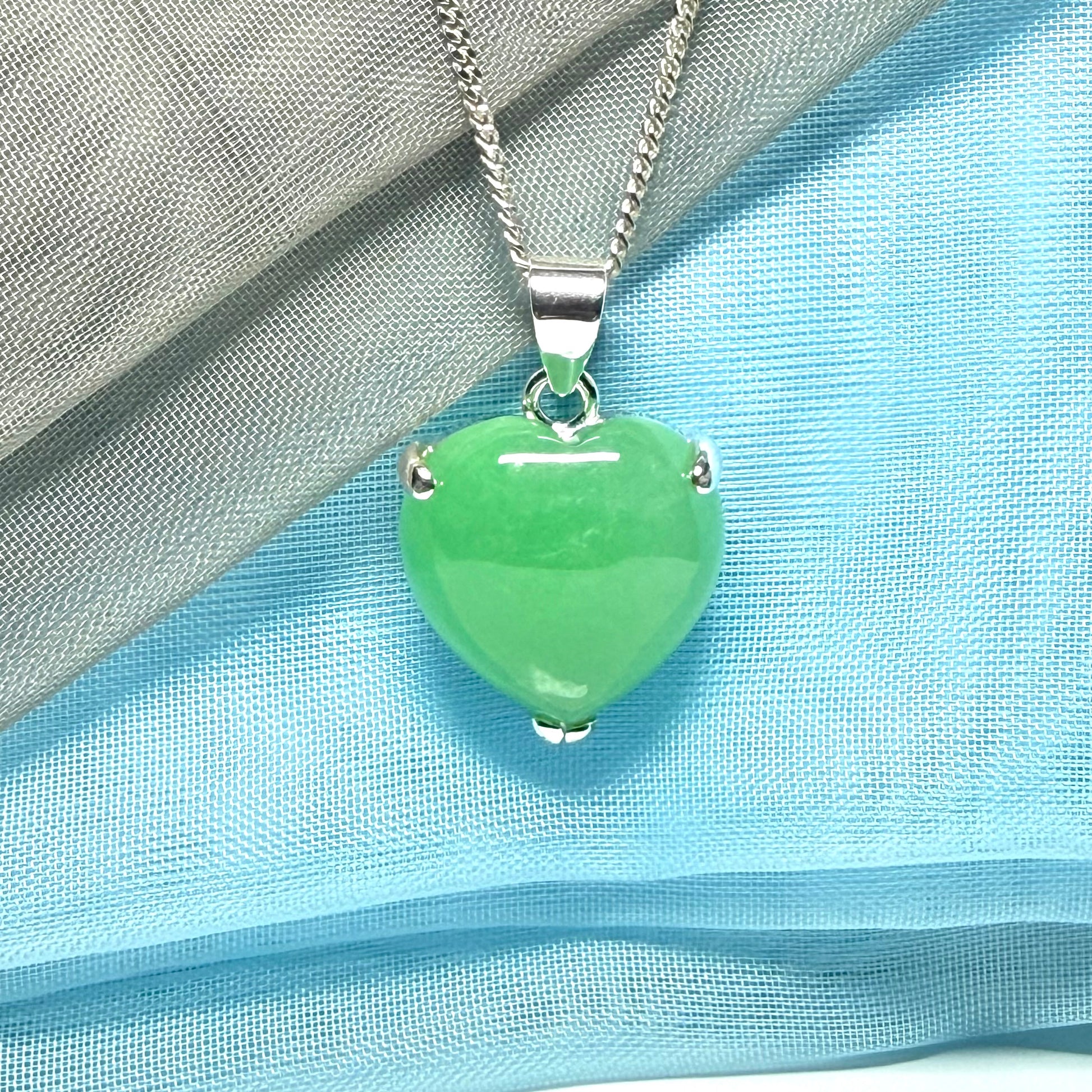 A real green jade necklace heart shaped sterling silver with chain