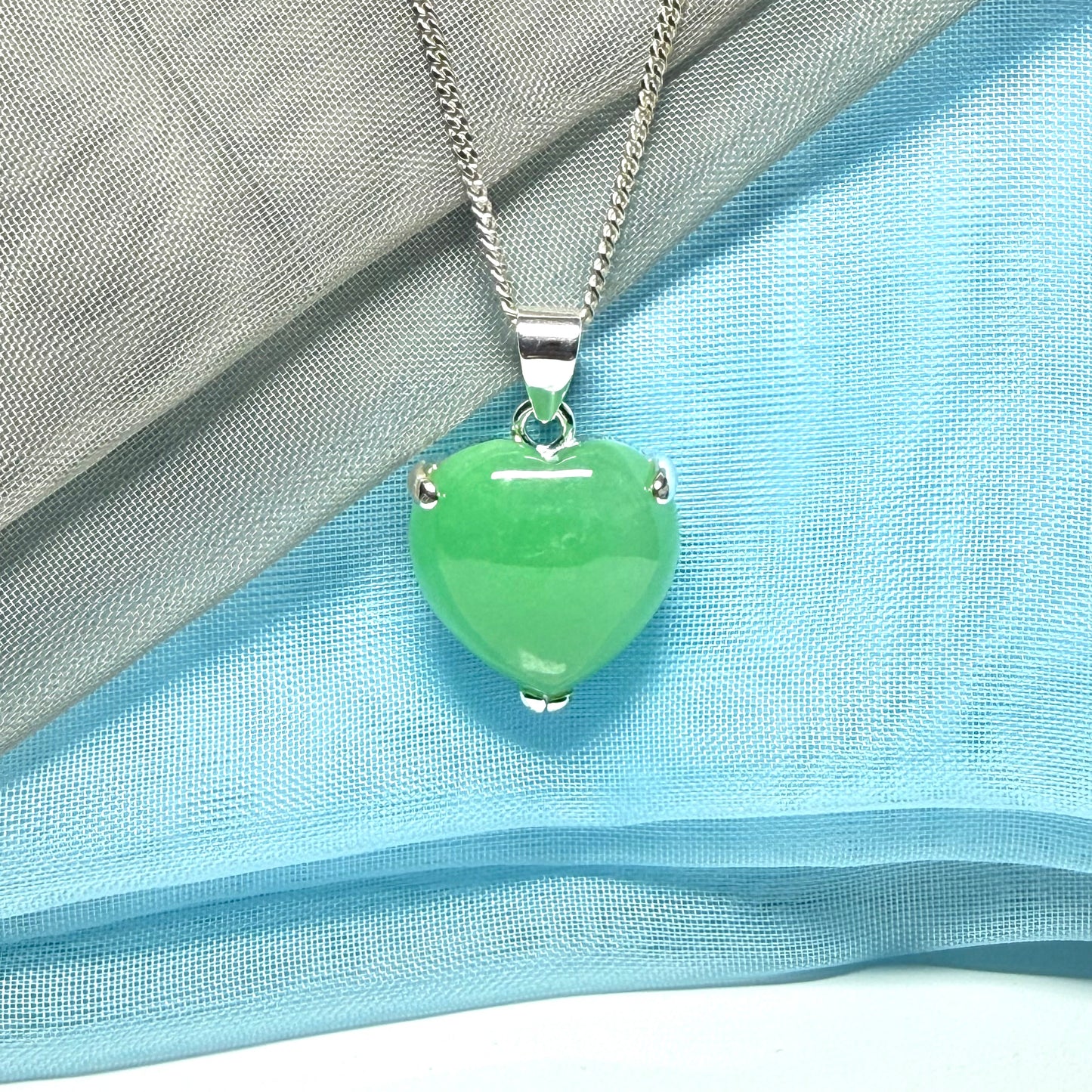 A real green jade necklace heart shaped sterling silver with chain