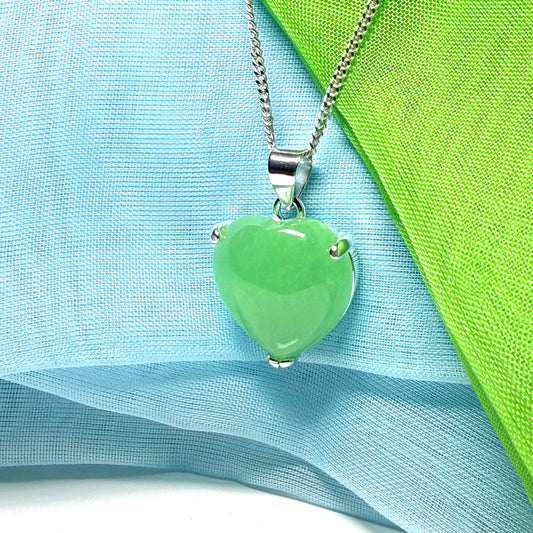 A stunning real green jade necklace heart shaped sterling silver with chain included as well