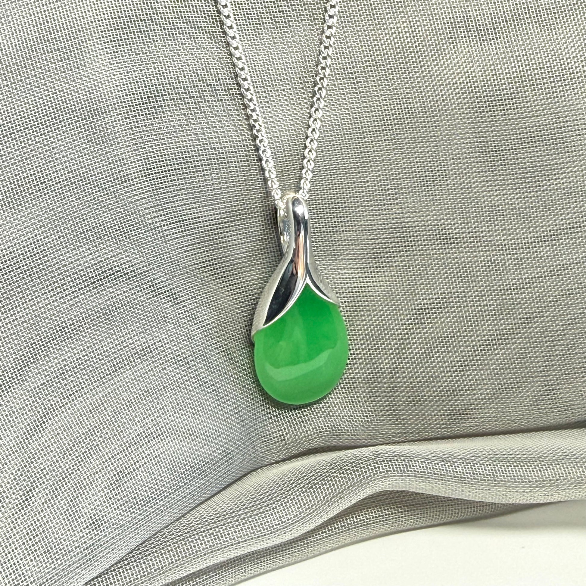 A stunning real green jade necklace in a teardrop, a timeless designed pendant