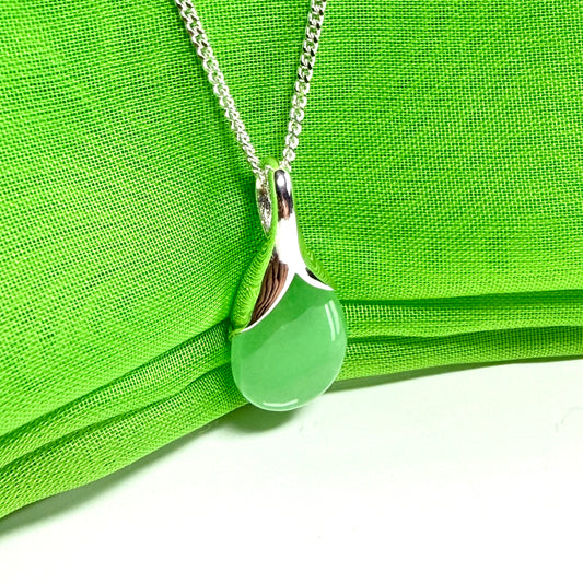 A stunning real green jade necklace in a teardrop, a timeless designed pendant and chain