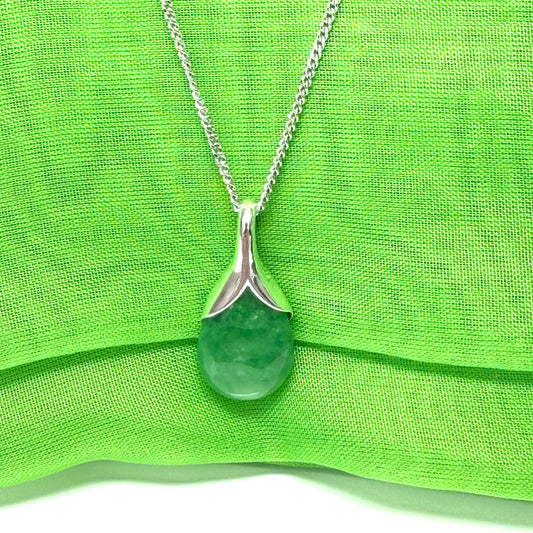 A stunning real green jade necklace with a teardrop pendant pear shape