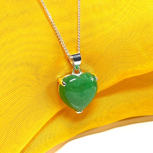 A stunning real green jade pendant heart shaped sterling silver, a traditional design necklace
