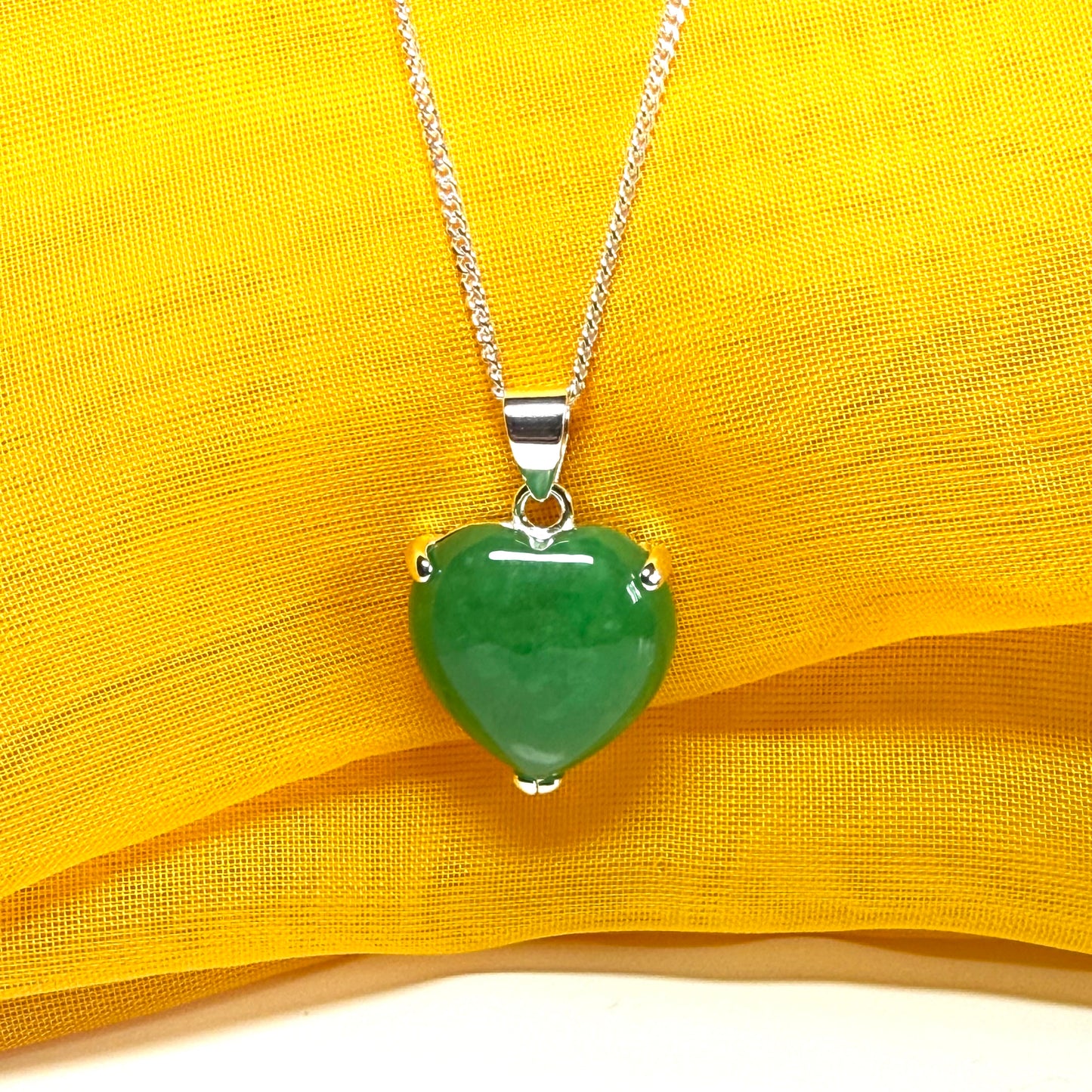 A stunning real green jade pendant heart shaped sterling silver, a traditional design necklace with chain