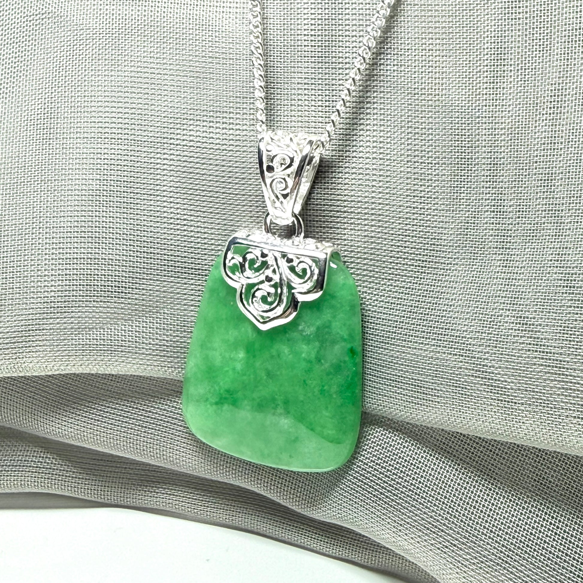 A stunning real jade necklace green sterling silver large cushion shaped pendant