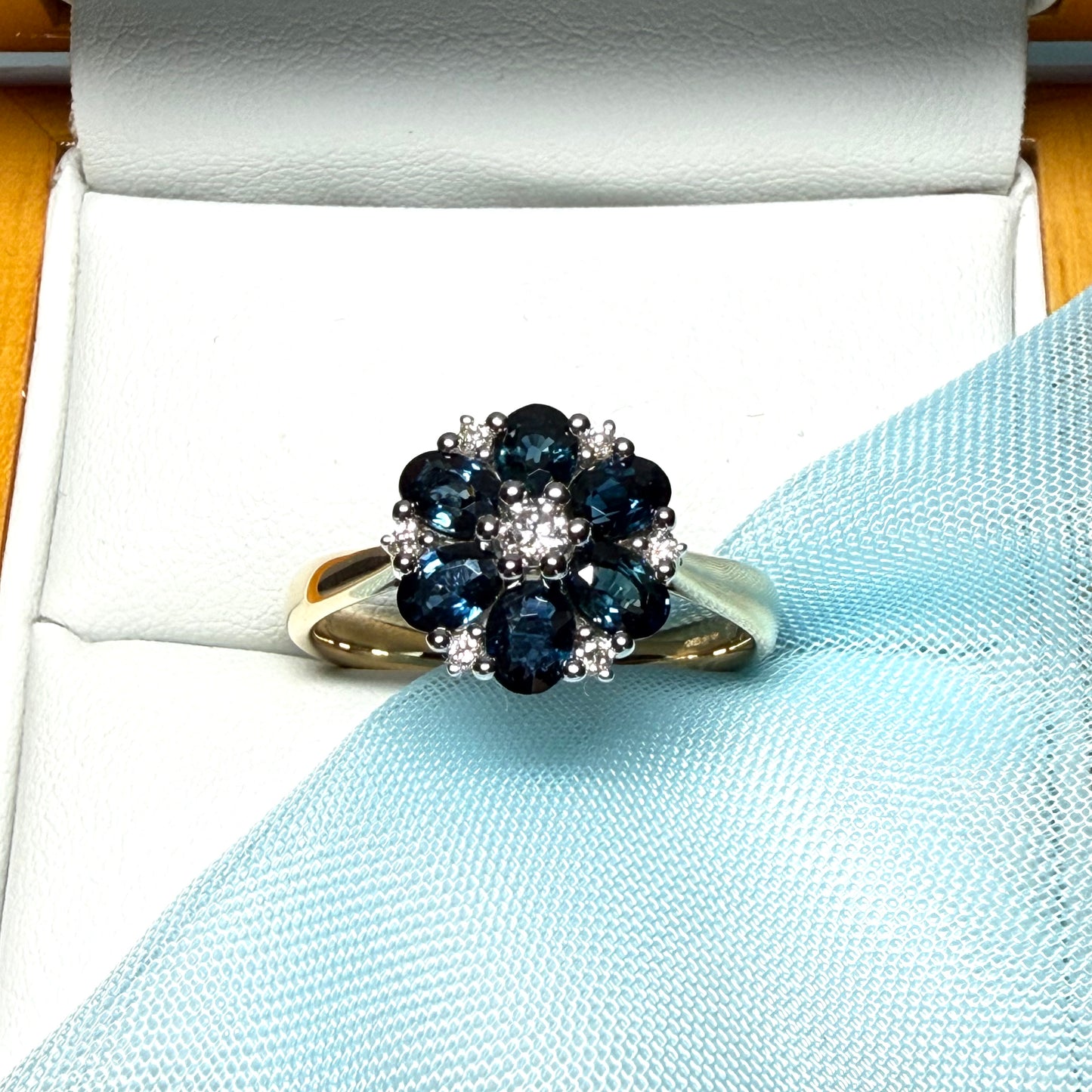 Yellow gold real dark blue sparkling sapphire and diamond round shaped cluster ring
