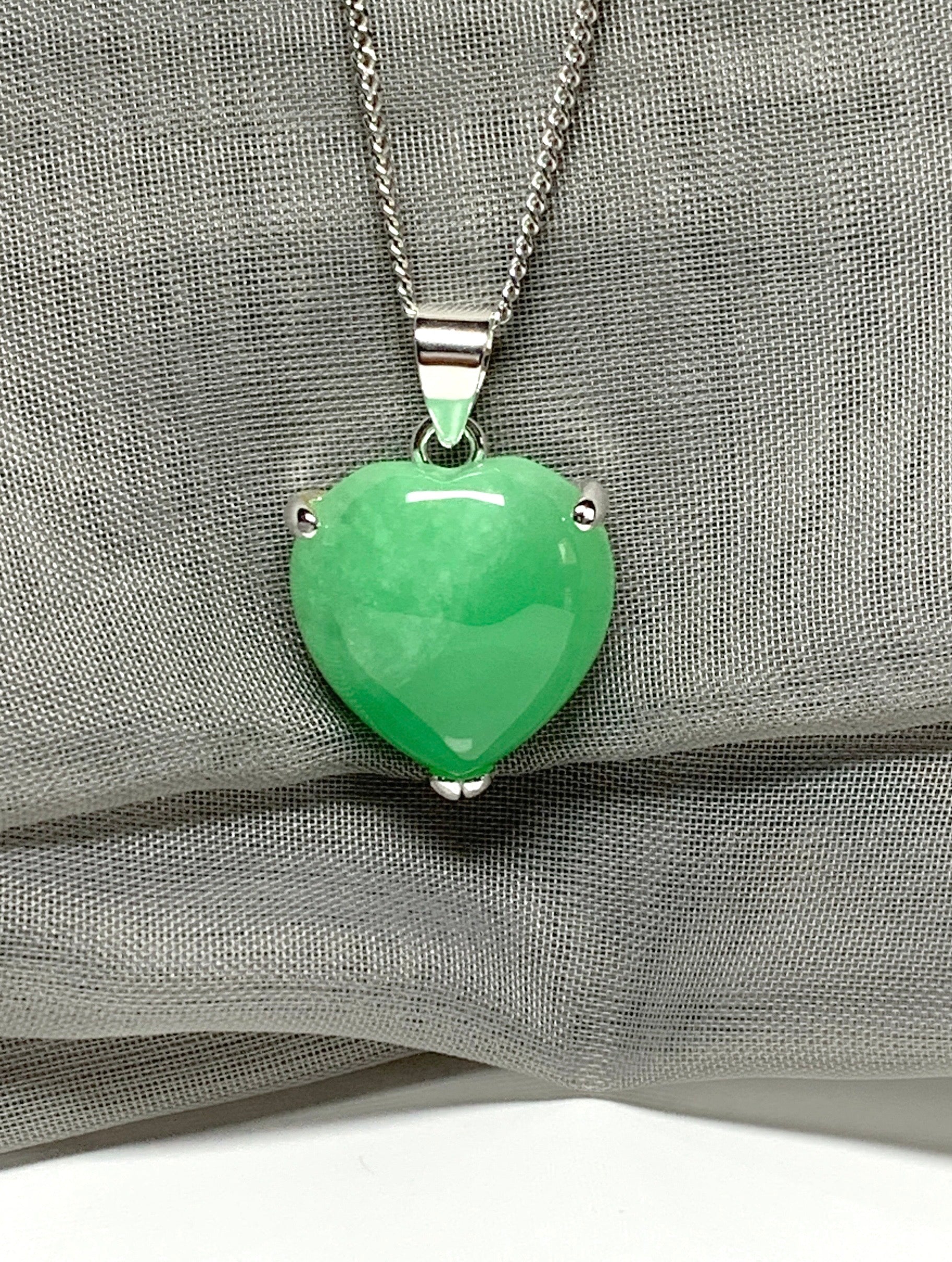 A beautiful and stunning real green jade necklace heart shaped sterling silver pendant