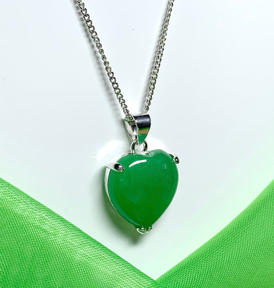 A beautiful real green jade necklace heart shape sterling silver pendant