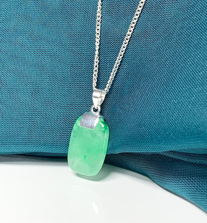 A cushion shaped silver real green jade necklace pendant