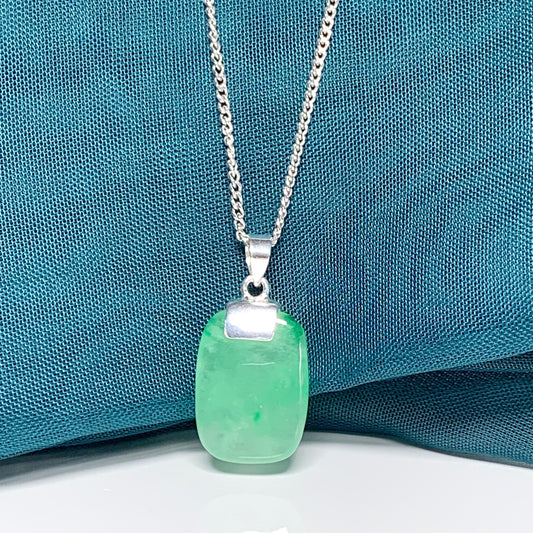 A cushion shaped silver real green jade necklace pendant