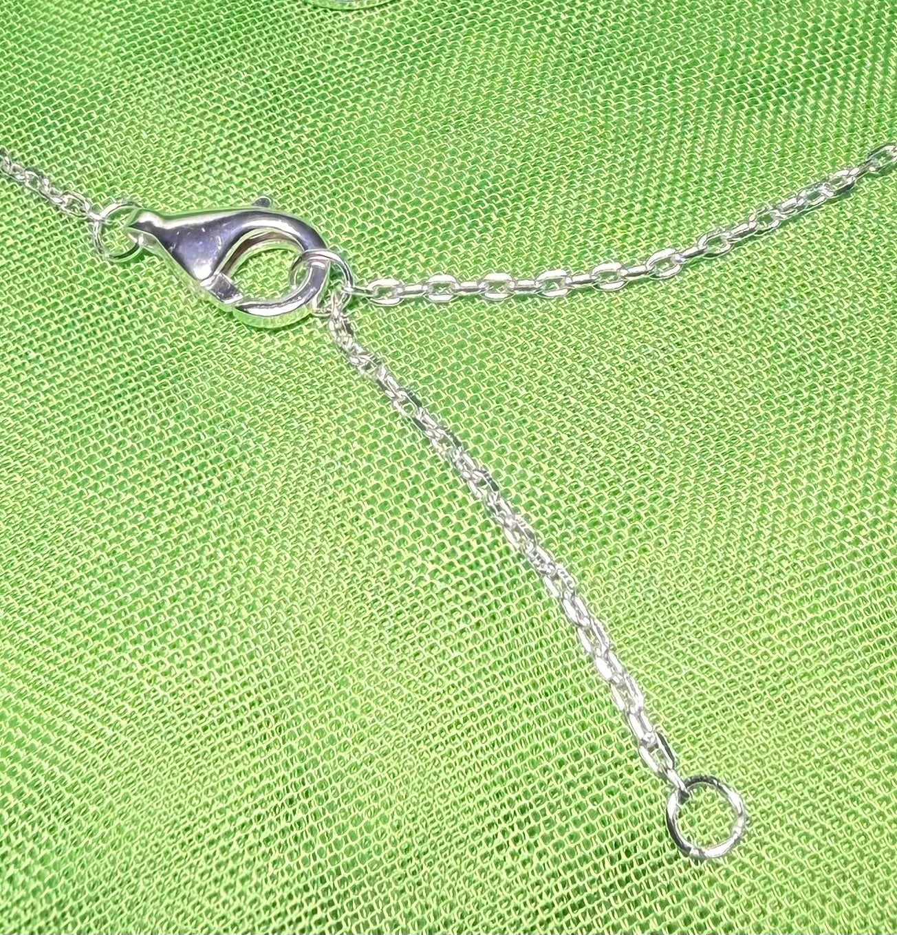 Adjuster chain link 