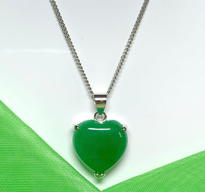 A gorgeous real green jade necklace heart shape sterling silver pendant