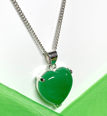 A gorgeous real green jade necklace heart shape sterling silver pendant