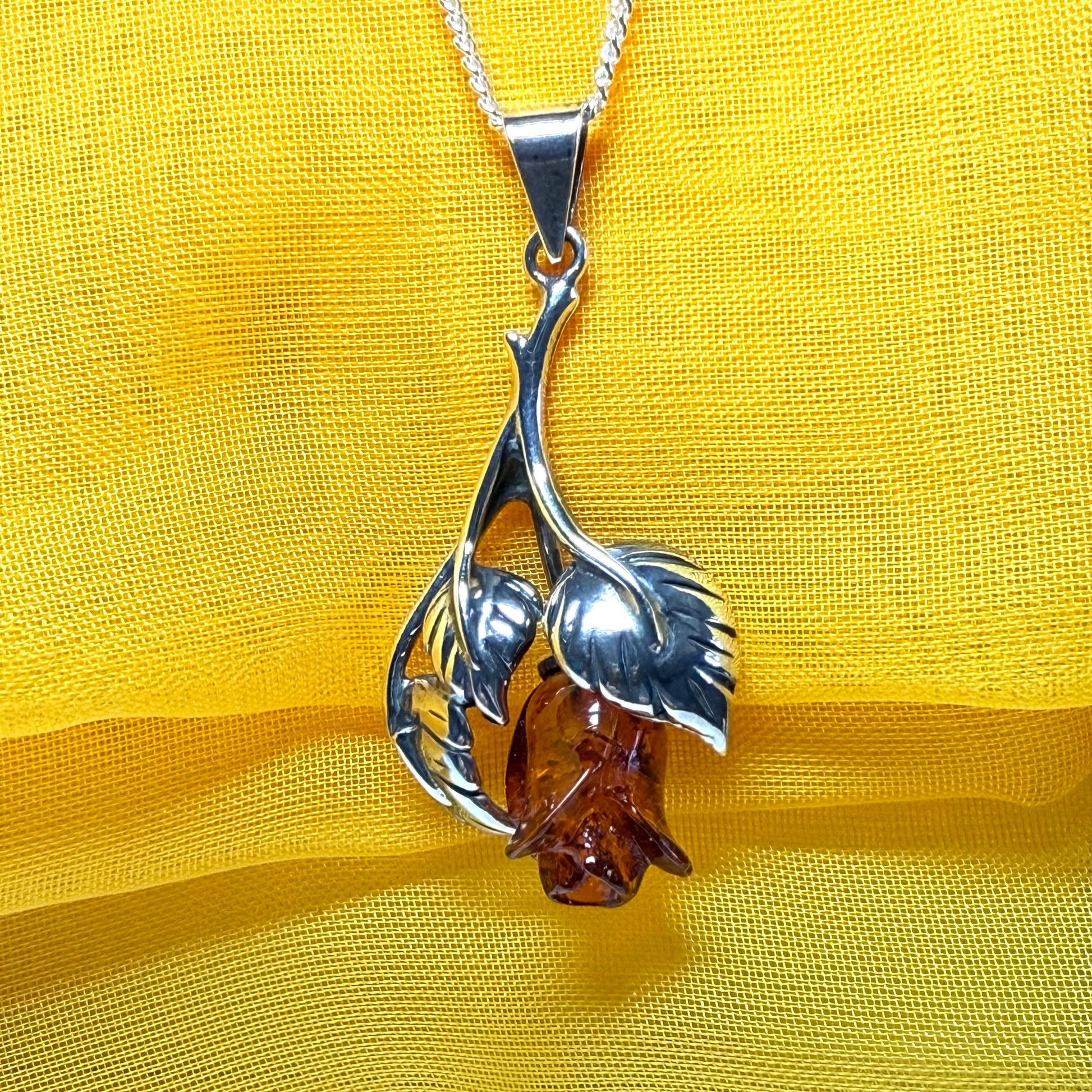 Amber rose shaped necklace sterling silver