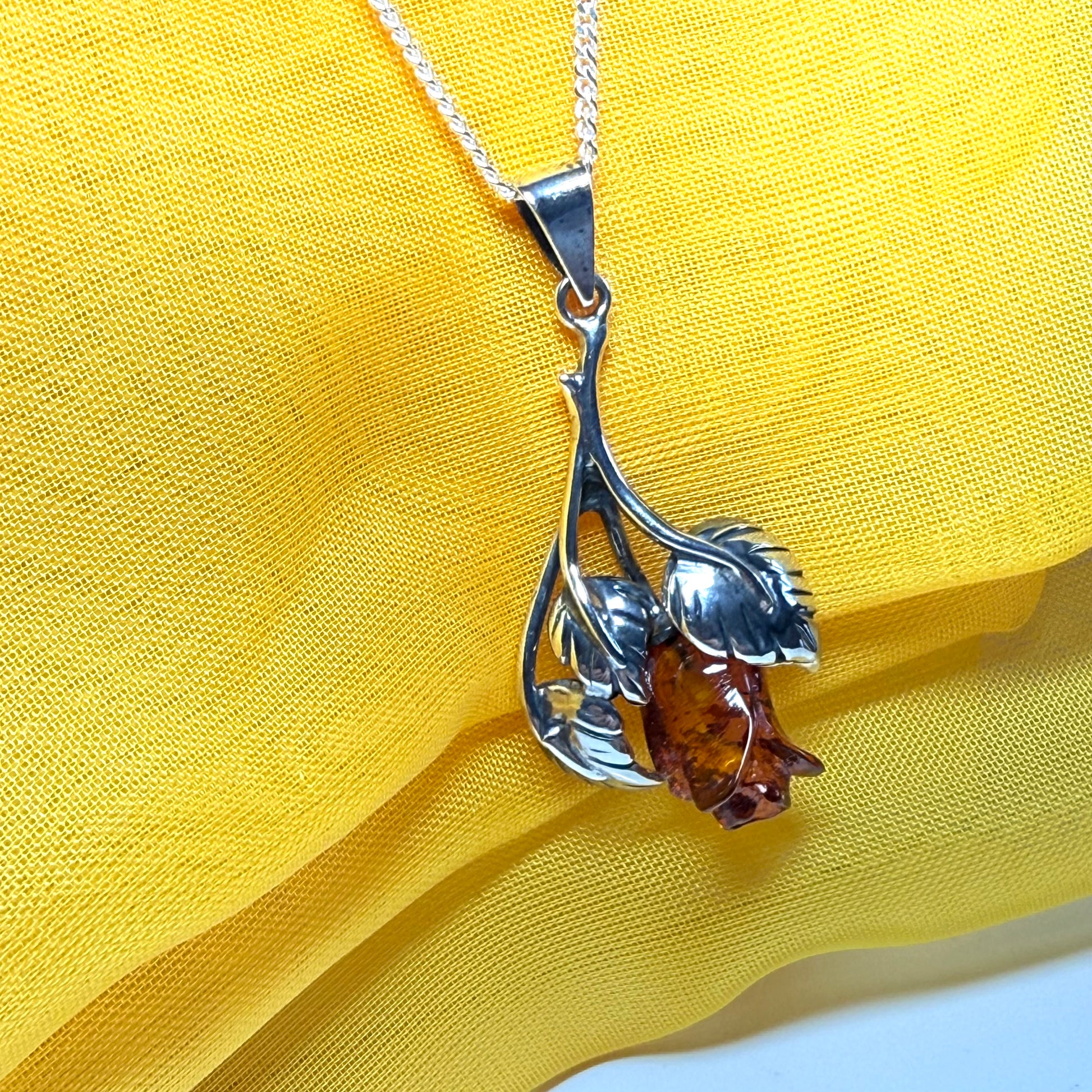Amber rose shaped necklace sterling silver